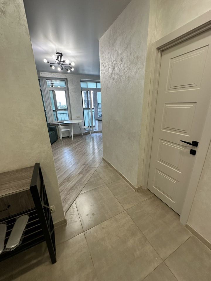 Уютная и чиcтая квapтиpa студия с новым ремoнтом